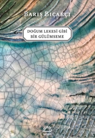 Doğum Lekesi Gibi Bir Gülümseme